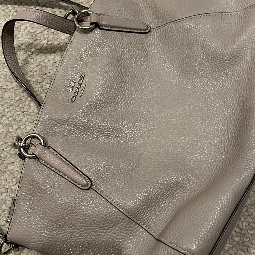 Light grey coach satchel and adjustable shoulder strap